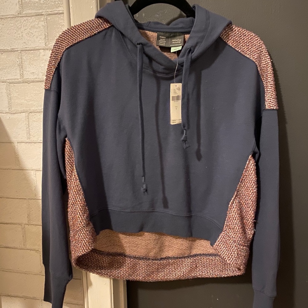Slightly cropped blue hoodie. Very unique!